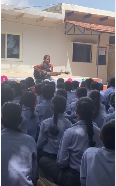 Preeti dedicating a song to teachers